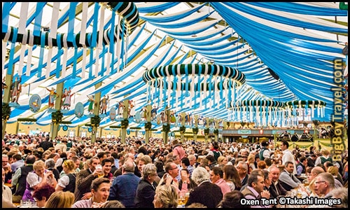 Interior view of a lively Oktoberfest beer tent
