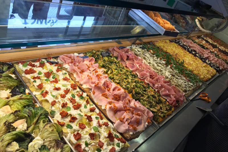 Selection of gourmet pizza slices at Pizzarium Bonci.