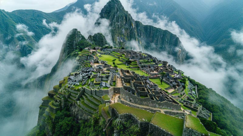 Ancient Inca citadel of Machu Picchu shrouded in morning mist, highlighting its historical significance.