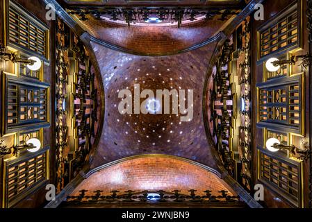 The soaring dome and intricate ironwork in the central hall of Palau Güell