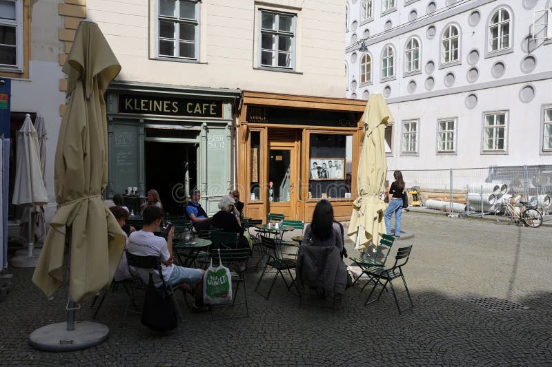 Outdoor seating at a traditional Viennese street cafe