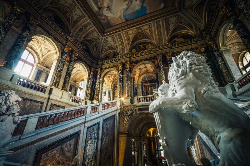 Grand staircase inside the Kunsthistorisches Museum Vienna adorned with frescoes and sculptures