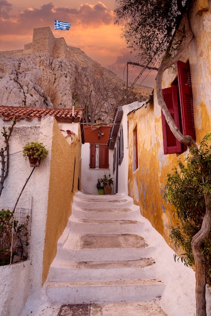 Charming streets of Anafiotika village in Athens at sunset.