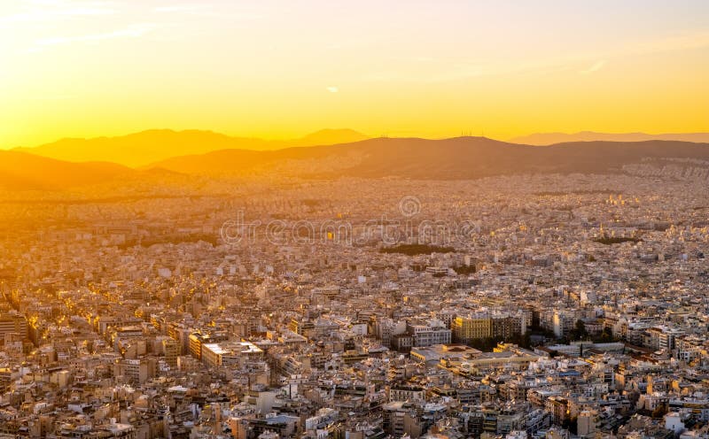 Panoramic sunset view from Lycabettus Hill over Athens.