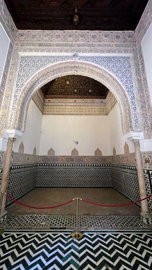 Intricate architectural details and geometric patterns inside the Alhambra palace