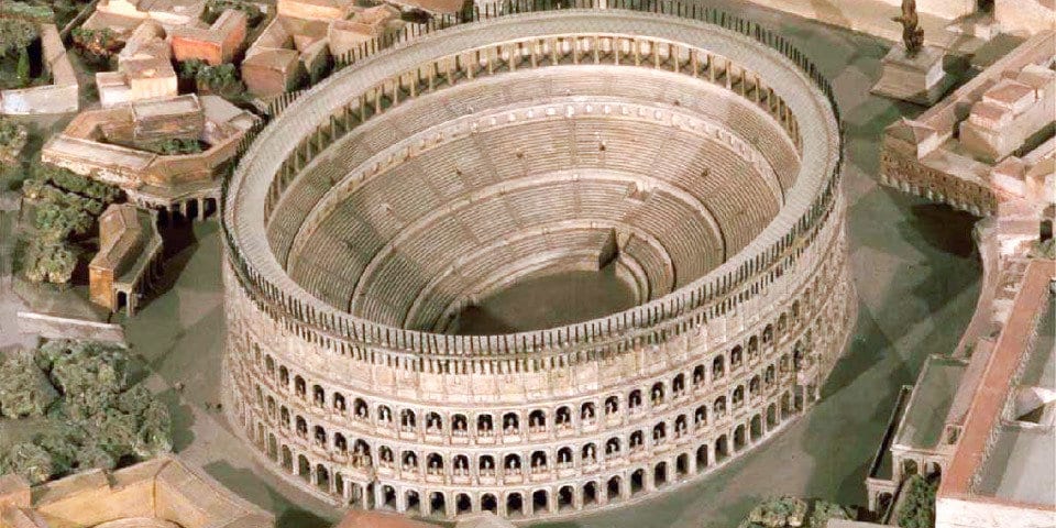 Interior view of the ancient Roman Colosseum showcasing its historical grandeur.