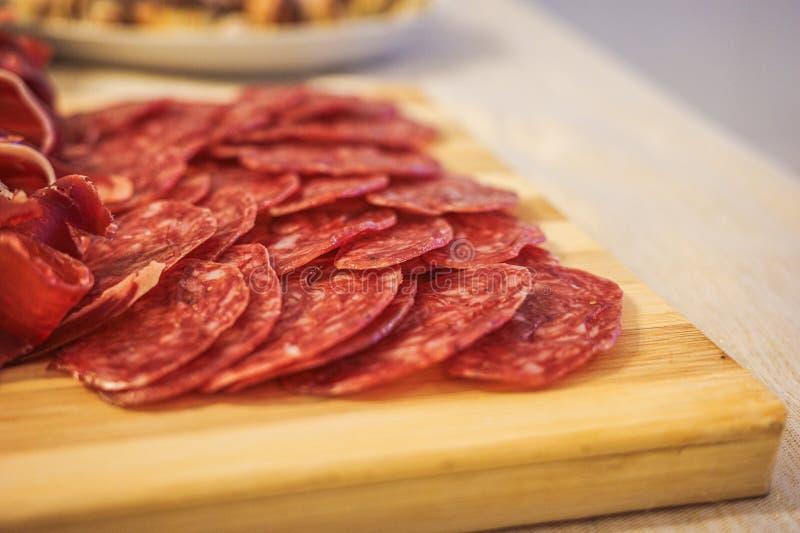 Delicious assortment of Spanish tapas dishes, including olives, cheese, and cured meats